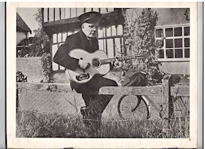 Singing Postman with Guitar